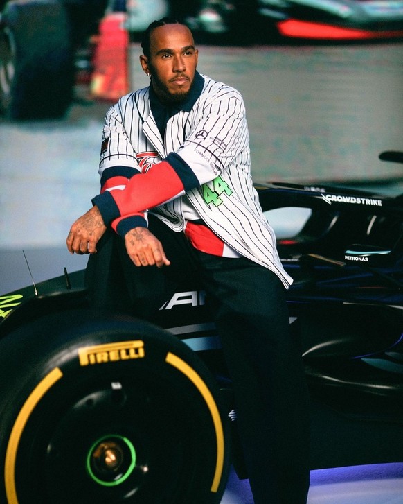 Lewis Hamilton, ladies and gentlemen.  He should also win the coolness contest against Tom.