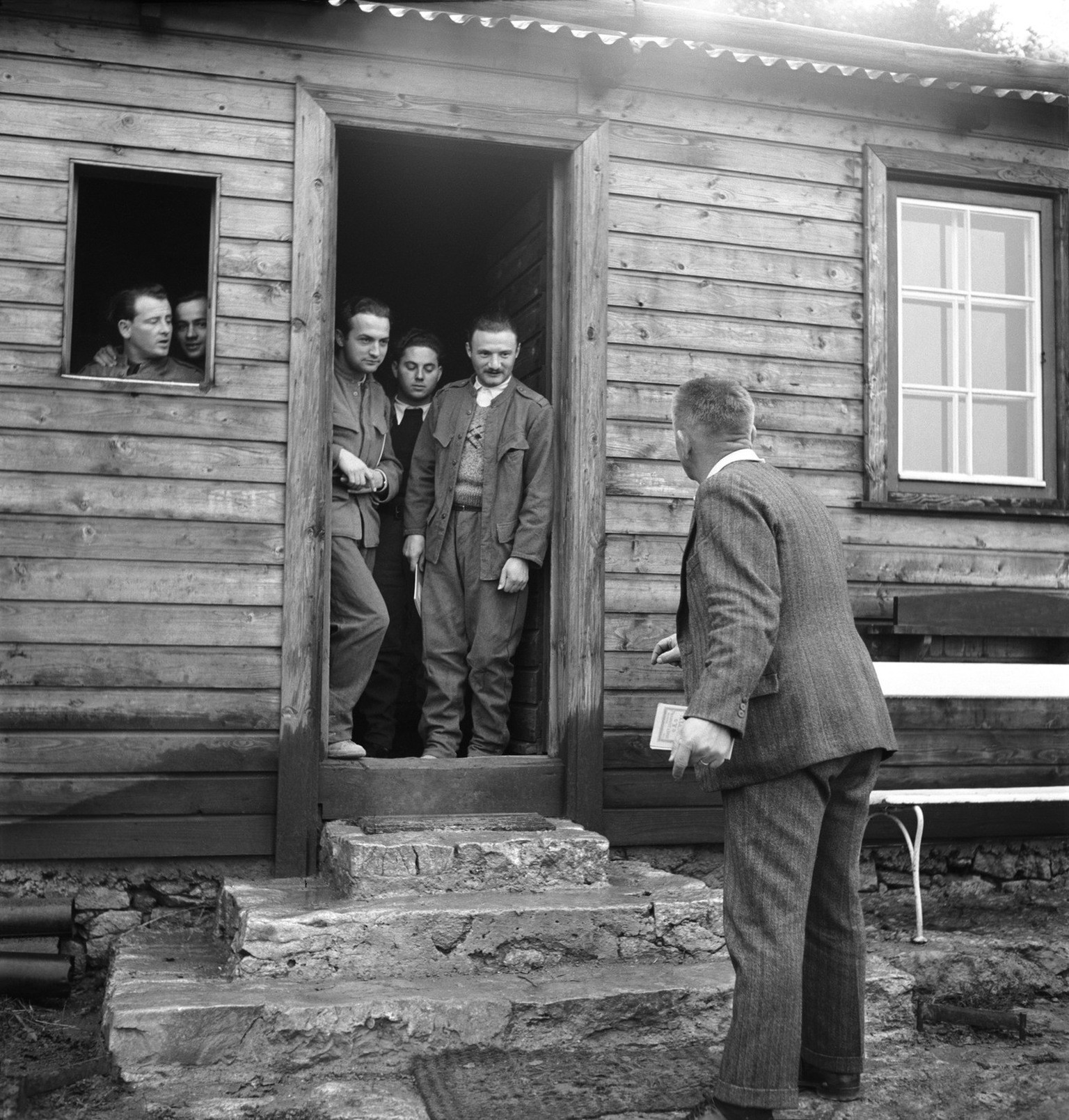 Jewish refugees talk to the camp leader Fritz Wartenweiler at the refugee camp Herzberg in Aarau in the Canton of Aargau, Switzerland, pictured on November 3, 1938. During the Second World War Jewish  ...