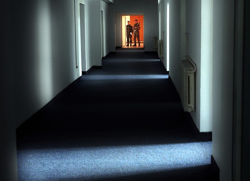 FILE - In this Wednesday, Nov. 9, 2005, file picture Romanian military staff stand at the end of a corridor on the Mihail Kogalniceanu airbase, near the Black Sea port of Constanta, Romania, a Soviet- ...