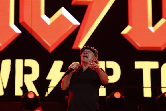epa11378403 Brian Johnson of British-Australian band AC/DC performs during a concert at La Cartuja stadium in Seville, Spain, 29 May 2024. EPA/JULIO MUNOZ