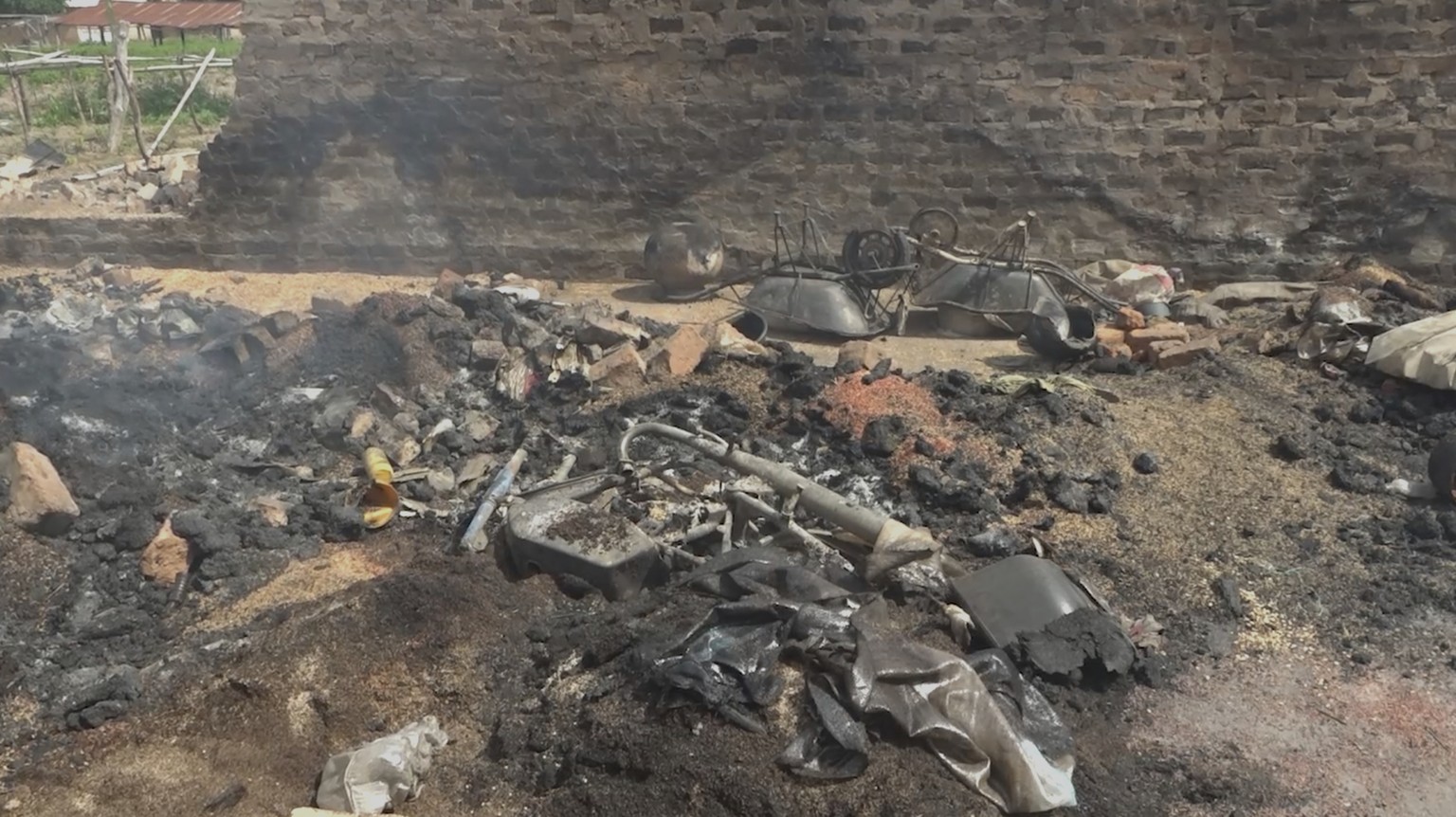 In this screengrab made from video, a burned house following an attack by gunmen in Yelewata community north-central Nigeria, Monday, June 16, 2025. (AP Video)
Nigeria Attack