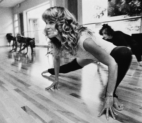 ** FILE ** Actress Jane Fonda exercises dressed in a leotard n her newly opened exercise salon, "Workout" in Beverly Hills, Calif., Sept 6, 1979. Jane Fonda will turn 70 on Dec. 21, 2007. (A ...
