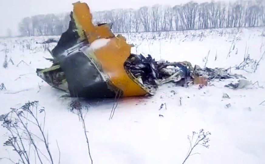 In this screen grab provided by the Life.ru, the wreckage of a AN-148 plane is seen in Stepanovskoye village, about 40 kilometers (25 miles) from the Domodedovo airport, Russia, Sunday, Feb. 11, 2018. ...