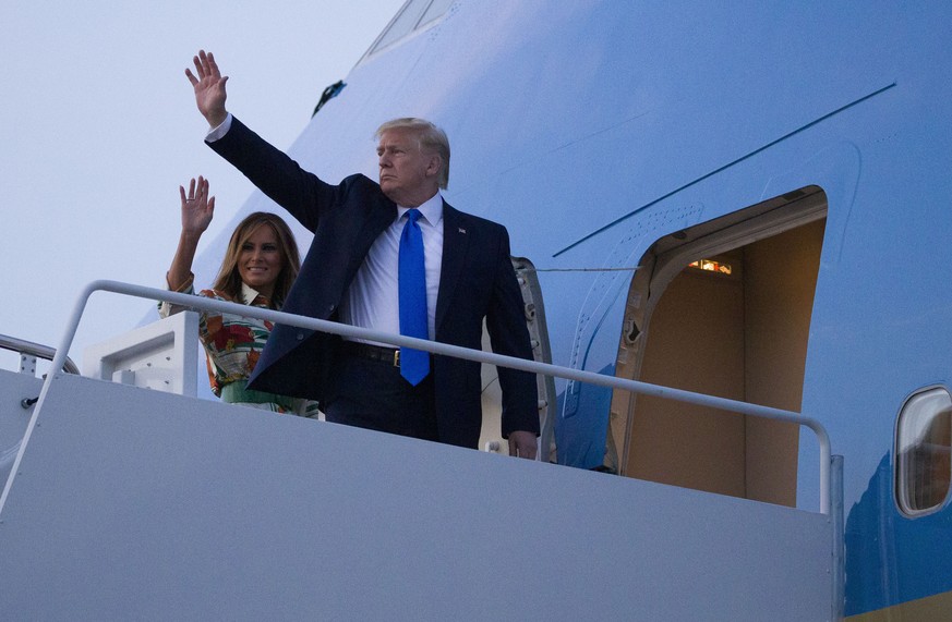 President Donald Trump, with first lady Melania Trump, wave as they board Air Force One as they depart Sunday, June 2, 2019, at Andrews Air Force Base, Md. Trump is going to London, France and Ireland ...