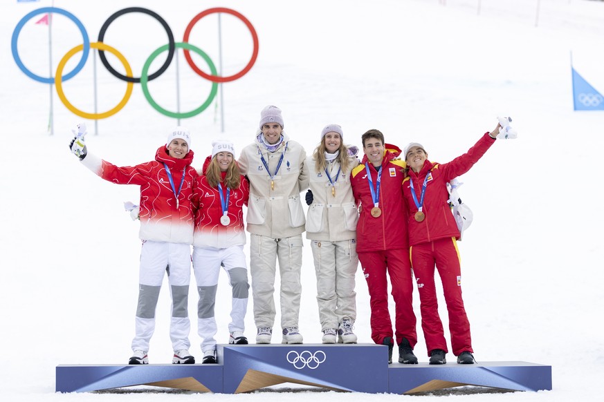 From left: Silver medalists Switzerland's Jon Kistler and Switzerland's Marianne Fatton, Gold medalists France's Thibault Anselmet and France's Emily Harrop and Bronze medalists Sp ...