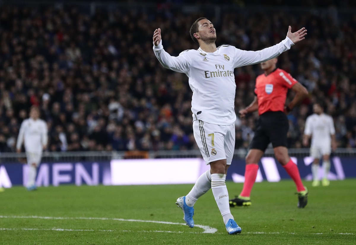 Real Madrid's Eden Hazard reacts during the Spanish La Liga soccer match between Real Madrid and Real Sociedad at the Bernabeu stadium in Madrid, Spain, Spain, Saturday, Nov. 23, 2019. (AP Photo/ ...