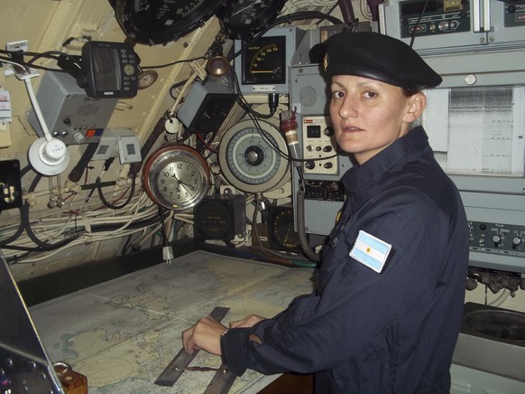On this undated photo released by the Argentine Navy, Eliana Krawczyk poses for a picture inside an Argentine submarine. Krawczyk, the first female submarine officer in Argentina, is one of 44 missing ...