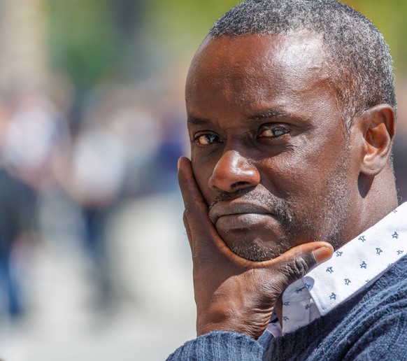 epa10655143 Sanda&#039;s father, Ousmane Dia leaves after the judgement of a court in the trial for the death of student Sanda Dia, at the Court of Appeal in Antwerp, Belgium, 26 May 2023. A court in  ...