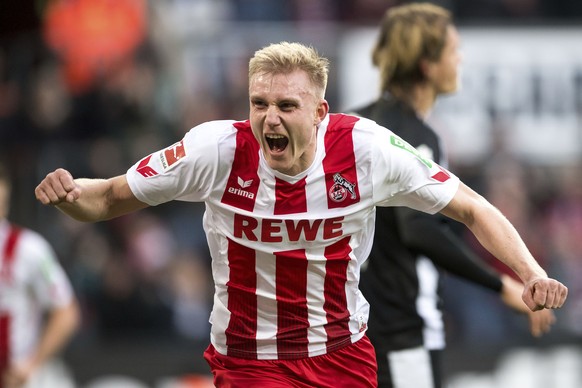 Cologne scorer Frederik Soerensen celebrates after his opening goal during the German Bundesliga soccer match between 1. FC Cologne and Borussia Moenchengladbach at the RheinEnergieStadion in Cologne, ...
