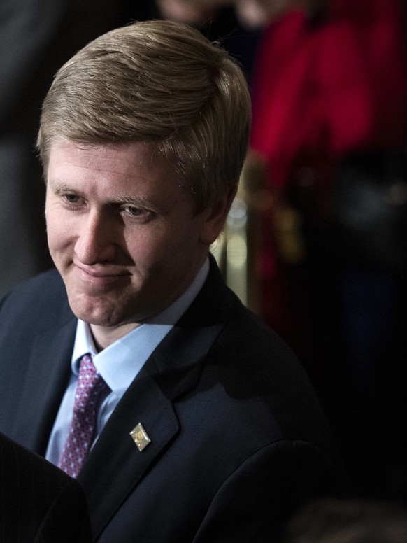 FILE - In a Monday, Dec. 3, 2018 file photo, Nick Ayers, right, listens as Supreme Court Associate Justice Neil Gorsuch waits for the arrival of the casket for former President George H.W. Bush to lie ...