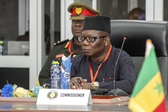 ECOWAS Commissioner Abdel-Fatau Musah listens to speeches during the Extraordinary Meeting of the ECOWAS Committee of Chiefs of the Defence Staff in Accra, Ghana, Thursday, August 17, 2023. (AP Photo/ ...