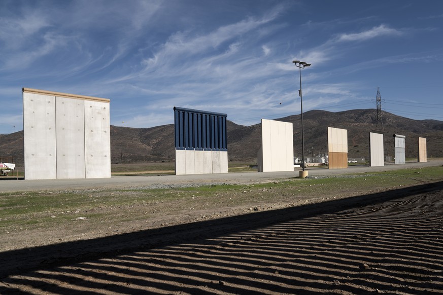 Border wall prototypes stand in San Diego near the Mexico U.S. border, seen from Tijuana, Saturday, Dec. 22, 2018. The U.S. federal government remains partially closed in a protracted standoff over Pr ...