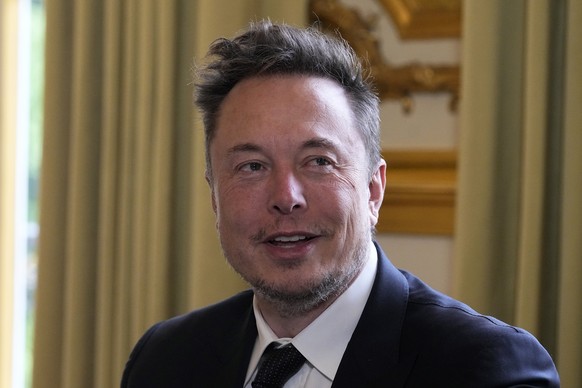 FILE - Twitter, now X. Corp., and Tesla CEO Elon Musk poses before his talks with French President Emmanuel Macron, May 15, 2023, at the Elysee Palace in Paris. A California man who says he was harass ...
