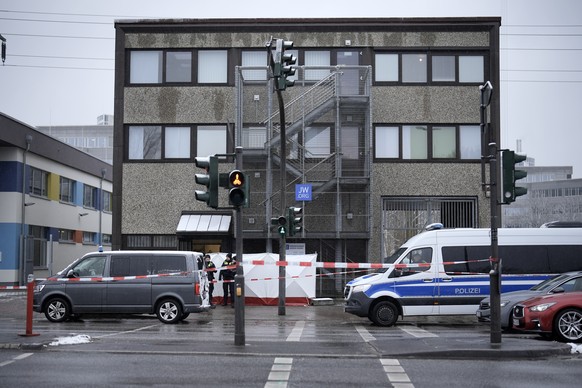 Police secured a street outside a Jehovah&#039;s Witness building in Hamburg, Germany Friday, March 10, 2023. Shots were fired inside the building used by Jehovah&#039;s Witnesses in the northern Germ ...