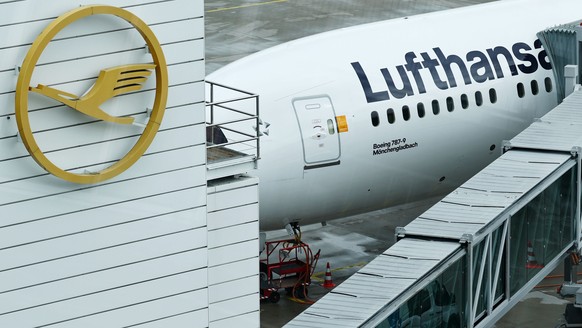 epa12813608 Lufthansa airplanes are parked at Munich International Airport during a Lufthansa strike in Munich, Germany, 12 March 2026. The Vereinigung Cockpit union (VC) has called for strikes at Luf ...