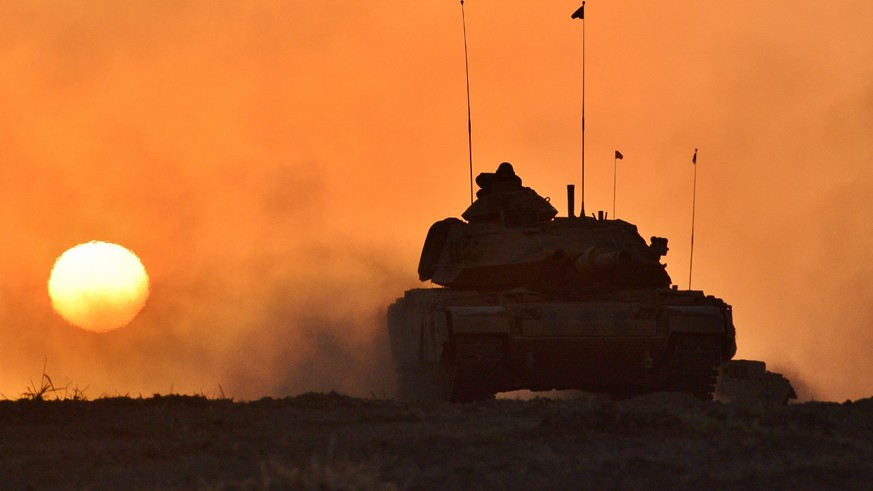 epa06235624 A handout photo made available by the Turkish General Staff press office shows Turkish soldiers with their tanks participate in a military exercise near the Turkish-Iraqi border in the Sil ...