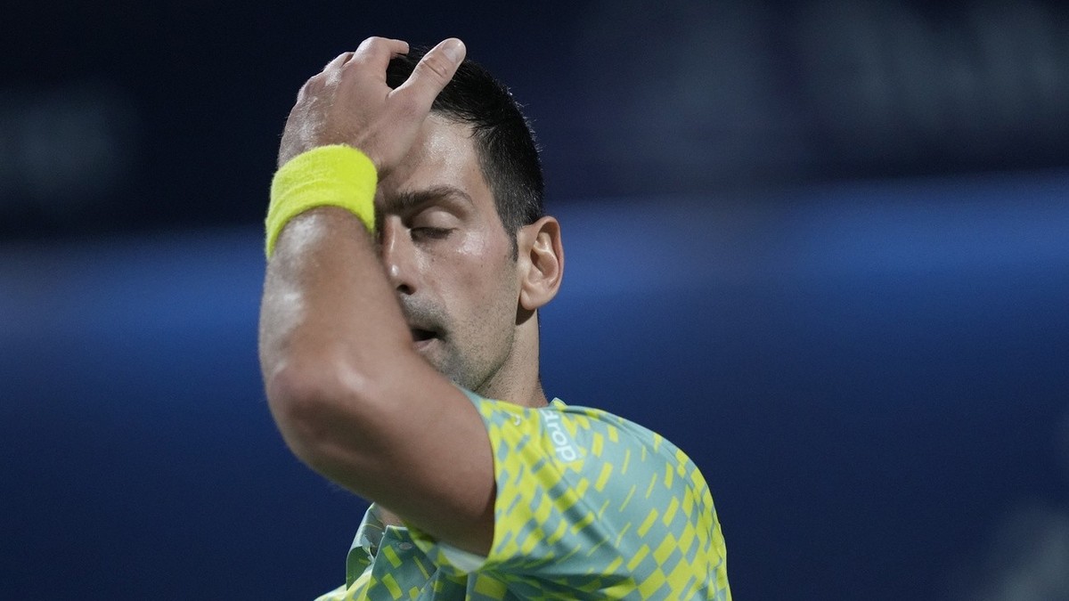 Serbia's Novak Djokovic reacts after he lost a point against Daniil Medvedev during their semi final match of the Dubai Duty Free Tennis Championships in Dubai, United Arab Emirates, Friday, Marc ...
