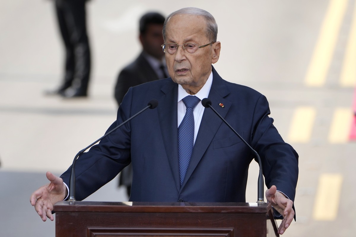 Lebanese President Michel Aoun delivers a speech to his supporters gathered outside the presidential palace in Baabda, east of Beirut, Lebanon, Sunday, Oct. 30, 2022. Aoun left Lebanon's presiden ...