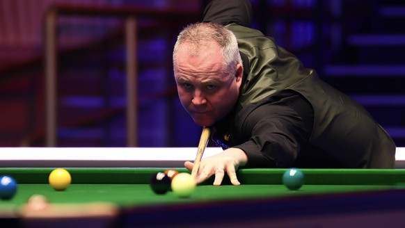 SOUTHPORT, ENGLAND - FEBRUARY 25: John Higgins of Scotland plays a shot during the 1st round match against Graeme Dott of Scotland on day two of 2020 Coral Players Championship at Southport Theatre an ...