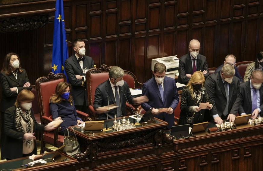 President of the Italian Senate, Maria Elisabetta Alberti Casellati, second from left, and President of the Italian Lower Chamber Roberto Fico, center, count ballots in the Italian parliament in Rome, ...