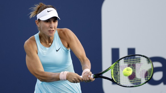 epa09102384 Belinda Bencic of Switzerland in action against Marketa Vondrousova of Czech Republic during their Women&#039;s singles match at the Miami Open tennis tournament in Miami Gardens, Florida, ...