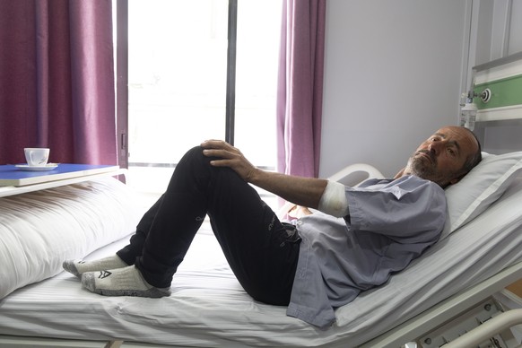 epa12501810 French climber Didier Berton receives treatment at the Era Hospital in Kathmandu, Nepal, 04 November 2025, after being rescued by helicopter from Yalung Ri Mountain. At least seven climber ...