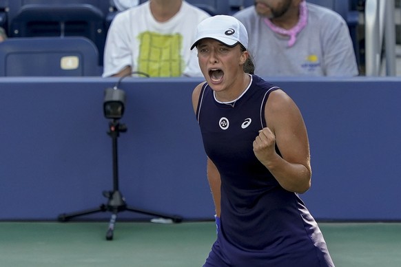 Iga Swiatek, of Poland, reacts after defeating Anett Kontaveit, of Estonia, during the third round of the US Open tennis championships, Saturday, Sept. 4, 2021, in New York. (AP Photo/Elise Amendola)