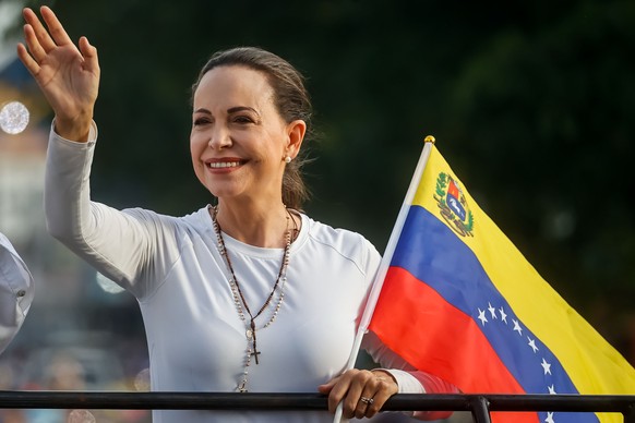 epa12444132 (FILE) Opposition leader Maria Corina Machado greets supporters during a campaign rally in Puerto La Cruz, Venezuela, 10 July 2024(reissued 10 October 2025). The Norwegian Nobel Committee  ...
