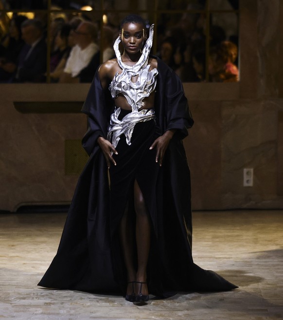 epa12225588 A model presents a creation from the Haute Couture Autumn/Winter 2025/2026 collection by Lebanese designer Robert Adi Nader during Paris Fashion Week, in Paris, France, 08 July 2025. The p ...