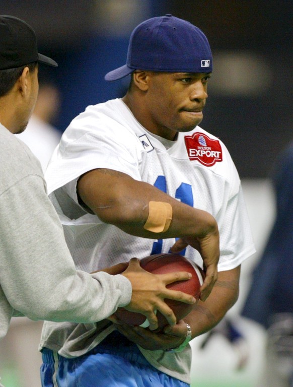 Montreal Alouettes running back Lawrence Phillips (R) takes part in the team&#039;s practice at Olympic Stadium in Montreal, in this November 16, 2002 file photo. Phillips, a former National Football  ...