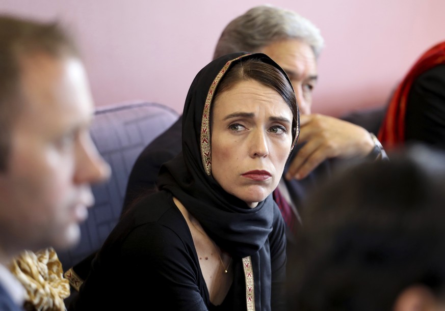 In this photo released by New Zealand Prime Minister&#039;s Office, Prime Minister Jacinda Ardern, center, meets representatives of the Muslim community, Saturday, March 16, 2019 at the Canterbury Ref ...