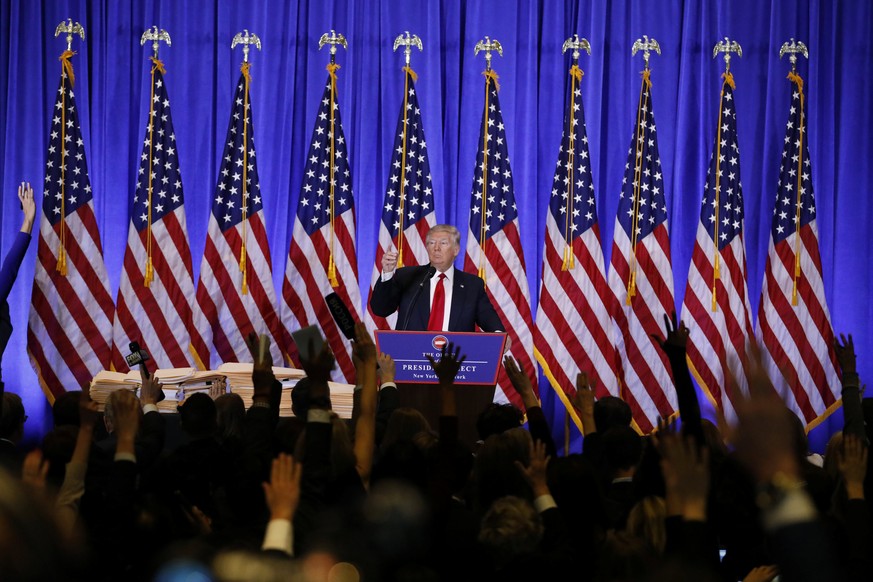 U.S. President-elect Donald Trump calls on reporters during a news conference in the lobby of Trump Tower in Manhattan, New York City, U.S., January 11, 2017. REUTERS/Lucas Jackson