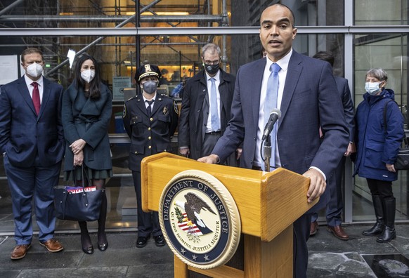 U.S. Attorney Nick Brown speaks on the steps of Federal Court, Tuesday, Jan. 11, 2022, in Seattle along with leadership from the FBI and Seattle Police Department about the Atomwaffen hate campaign fo ...