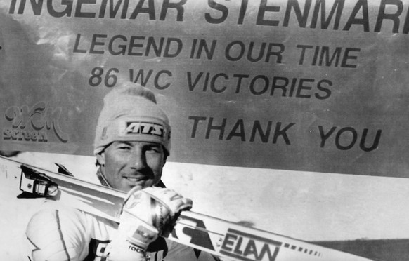 Ingemar Stenmark of Sweden walks by a flag which says all about him - Legend in our time - after the Swedish ace skier finished fourth in the World Cup Men&#039;s Giant Slalom Thursday, March 9, 1989, ...