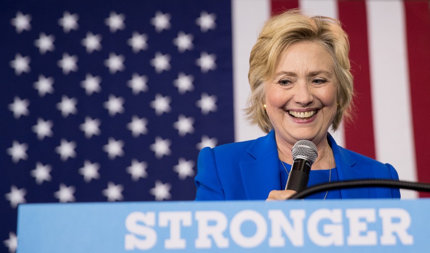 FILE - In this Thursday, Sept. 2016 file photo, Democratic presidential candidate Hillary Clinton pauses while speaking at a rally at Johnson C. Smith University, in Charlotte, N.C. House Republicans  ...