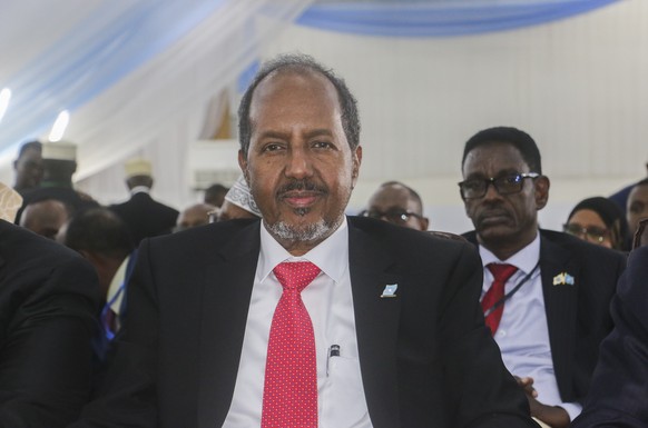 epa09949988 Former president Hassan Sheikh Mohamud after being sworn in as the new president of Somalia after being elected by Somali members of parliament in the presidential elections in the capital ...