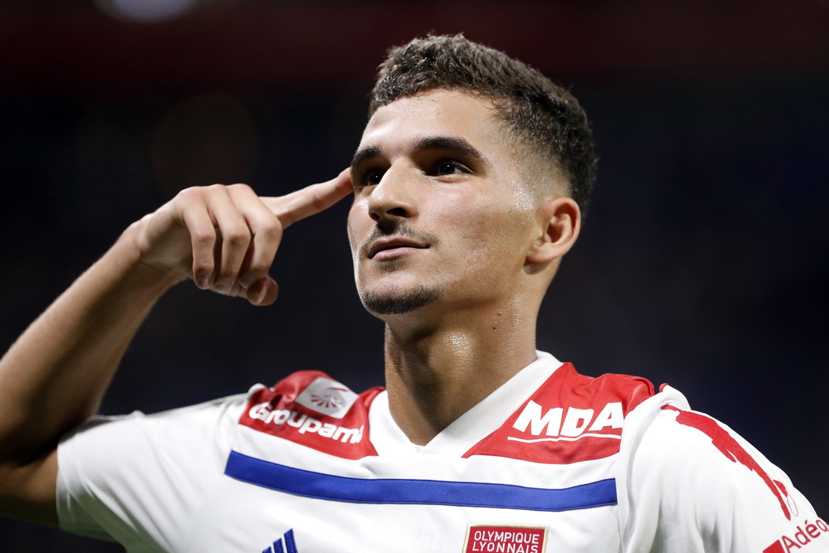 Lyon's Houssem Aouar celebrates after he scored a goal against Marseille during their French League One soccer match in Decines, near Lyon, central France, Sunday, Sept. 23, 2018. (AP Photo/Laure ...