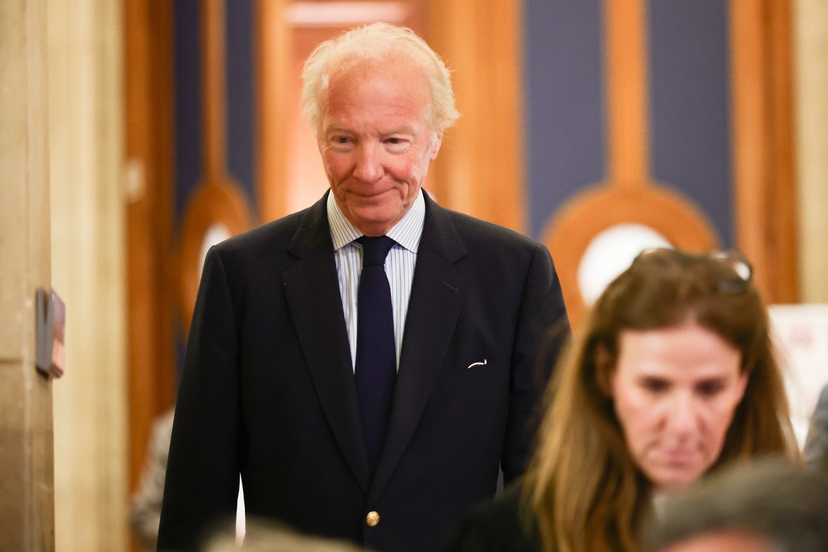 epa12872978 Former Interior Minister Brice Hortefeux leaves the courtroom during a pause on the first day of interrogation of former French president Nicolas Sarkozy during the appeal trial in the Lib ...
