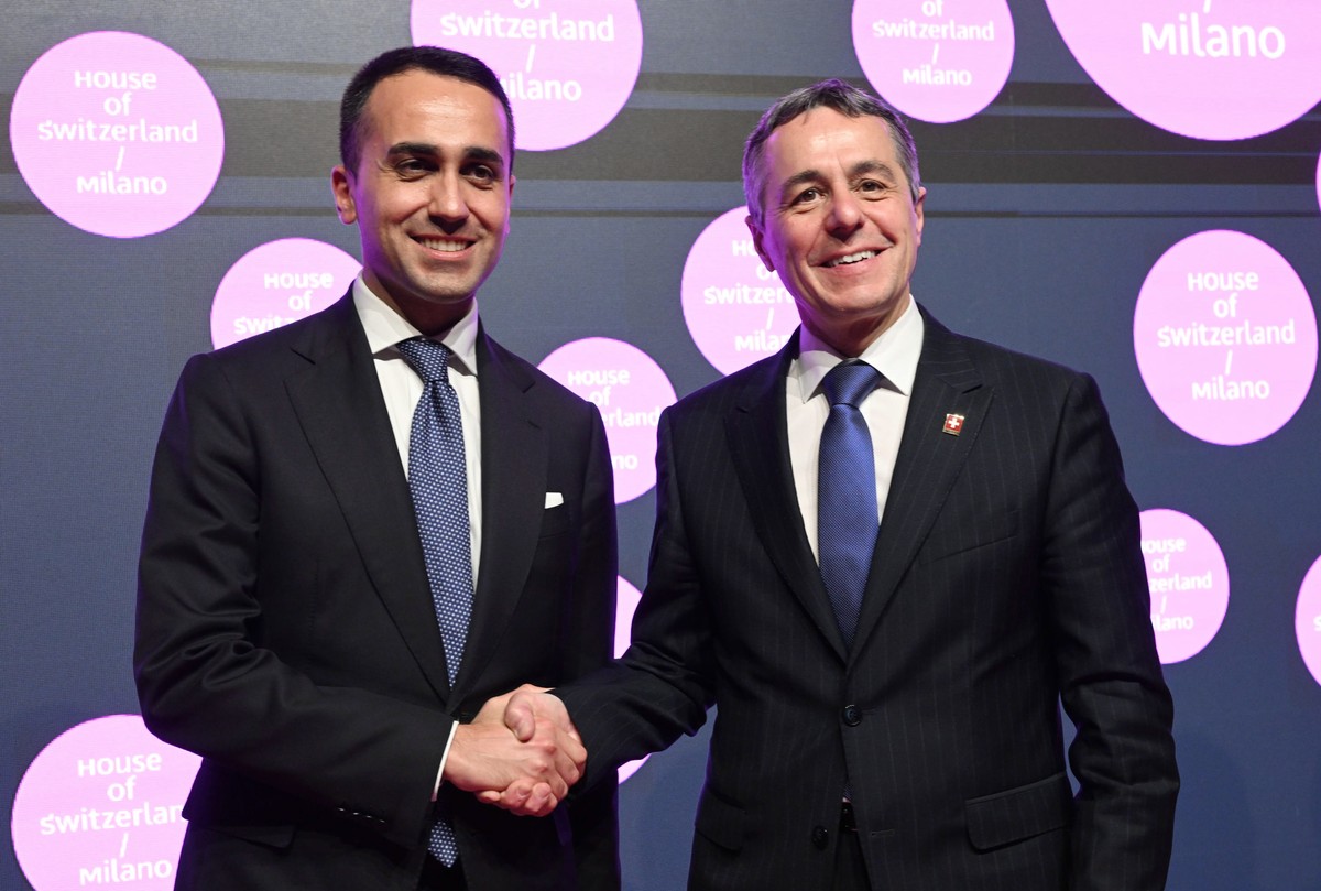epa09917415 Italian Foreign Minister Luigi Di Maio (L) and the President of Switzerland Ignazio Cassis attend the inauguration of the 'House of Switzerland' in Milan, Italy, 29 April 2022. E ...