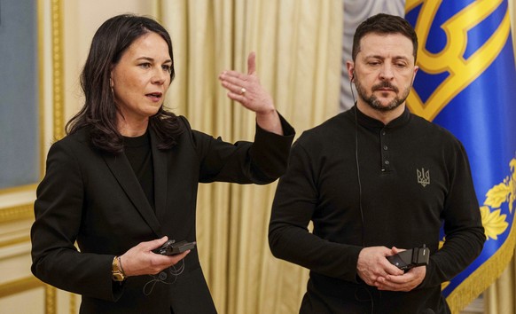 German Foreign Minister Annalena Baerbock and Ukrainian President Volodymyr Zelenskyy speak to journalists during a press conference in Kyiv, Ukraine, Tuesday, April 1, 2025. (AP Photo/Evgeniy Malolet ...