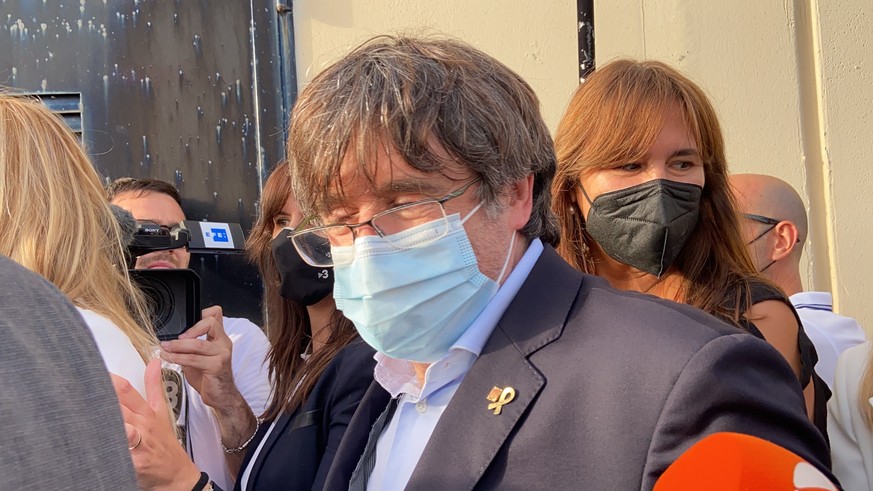 Catalan leader Carles Puigdemont, leaves the jail of Sassari, in Sardinia, Italy, Friday, Sept. 24, 2021. Puigdemont, sought by Spain for a failed 2017 secession bid, on Friday was released following  ...