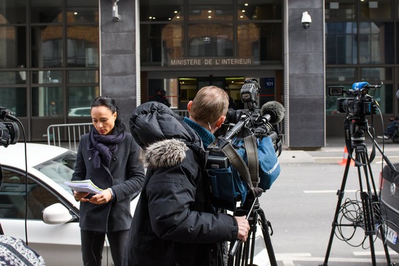 epa06616034 Journalists work outside the French Judiciary Police offices where former French president Nicolas Sarkozy (not pictured) is held for questioning in campaign finance case, in Nanterre, Par ...