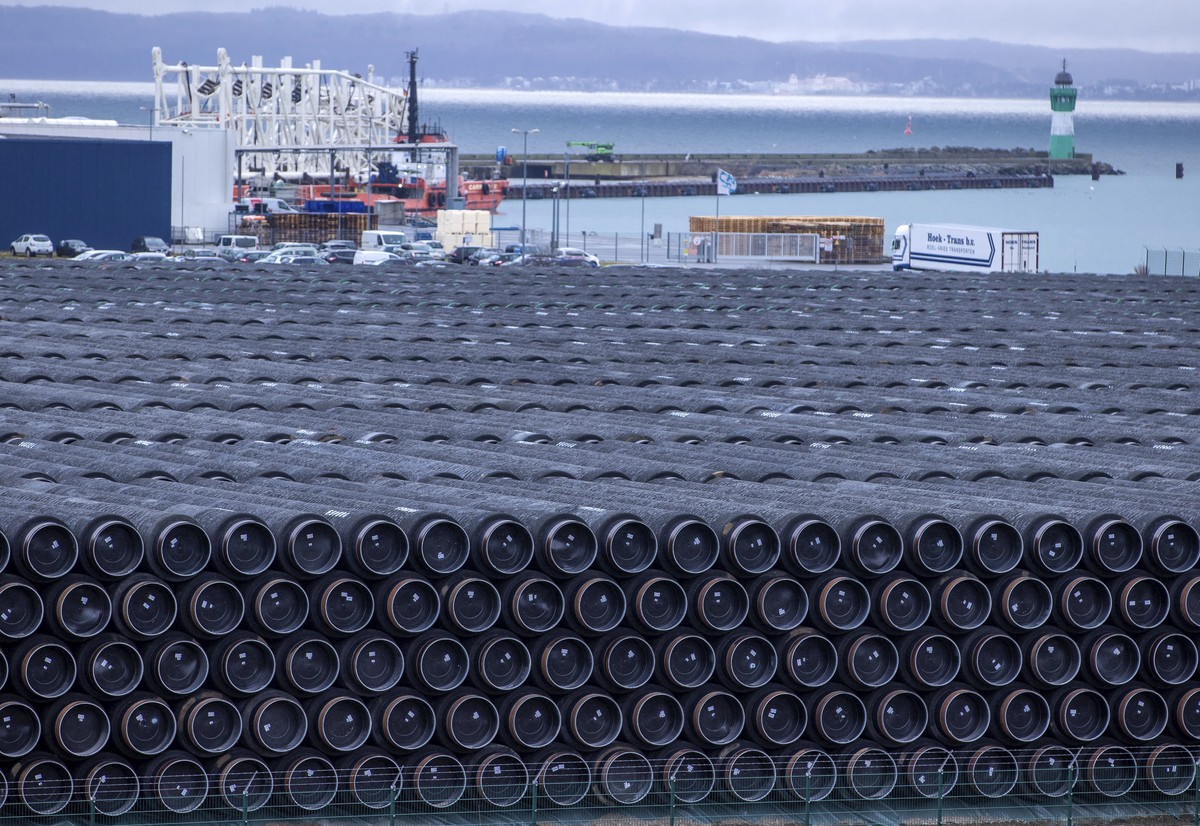 FILE - Pipes for the construction of the Nord Stream 2 natural gas pipeline from Russia to Germany and the Baltic Pipe from Denmark to Poland are stored at the port of Mukran in Sassnitz on the island ...