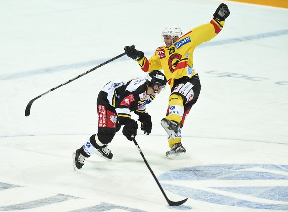 Luganos Linus Klasen (l.) prallt mit Berns 
Michael Loichat zusammen.