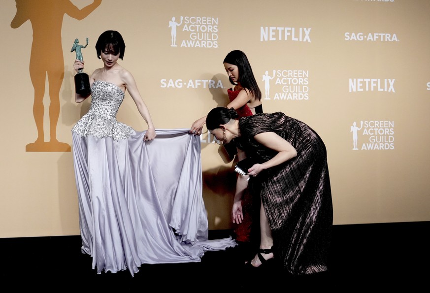 Moeka Hoshi, left, and Anna Sawai, winners of the award for outstanding performance by an ensemble in a drama series for "Shogun," pose in the press room during the 31st annual Screen Actors ...