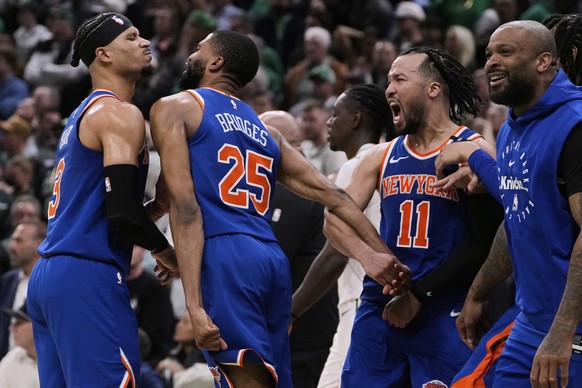 New York Knicks celebrate after defeating the Boston Celtics in Game 1 of an NBA basketball second-round playoff series Monday, May 5, 2025, in Boston. (AP Photo/Charles Krupa)
Knicks Celtics Basketba ...