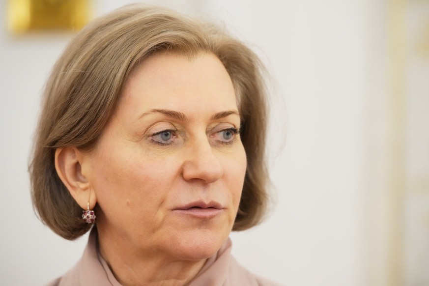 epa12921794 The Head of the Russian Federal Service for the Oversight of Consumer Protection and Welfare (Rospotrebnadzor) Anna Popova attends a meeting between Russian President Vladimir Putin and Re ...