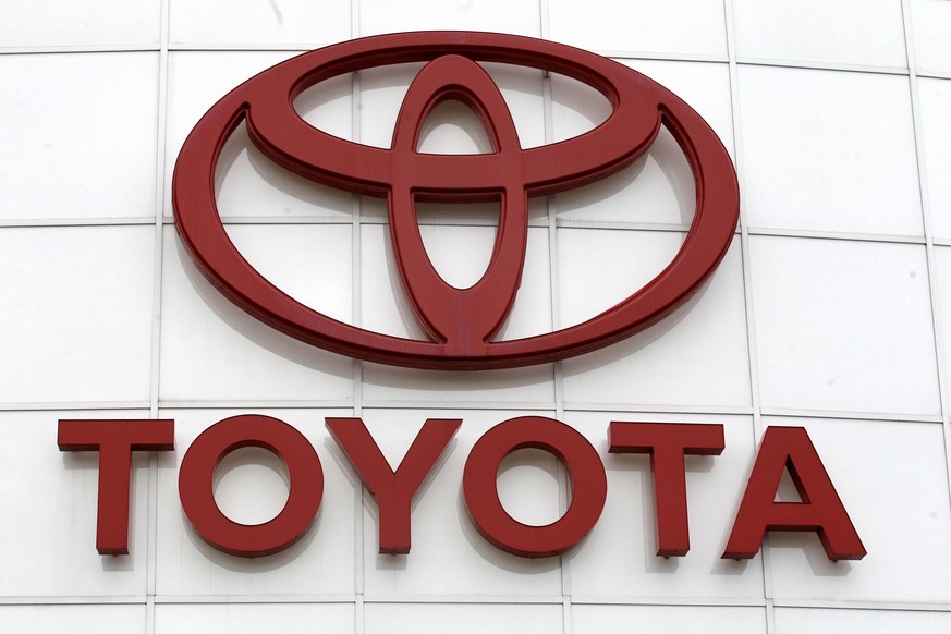 FILE - In this March 30, 2011 file photo, the Toyota logo is shown at Wilsonville Toyota, in Wilsonville, Ore. Toyota Motor Corp. is recalling 337,000 vehicles for a third time, Friday, Aug. 12, 2016. ...