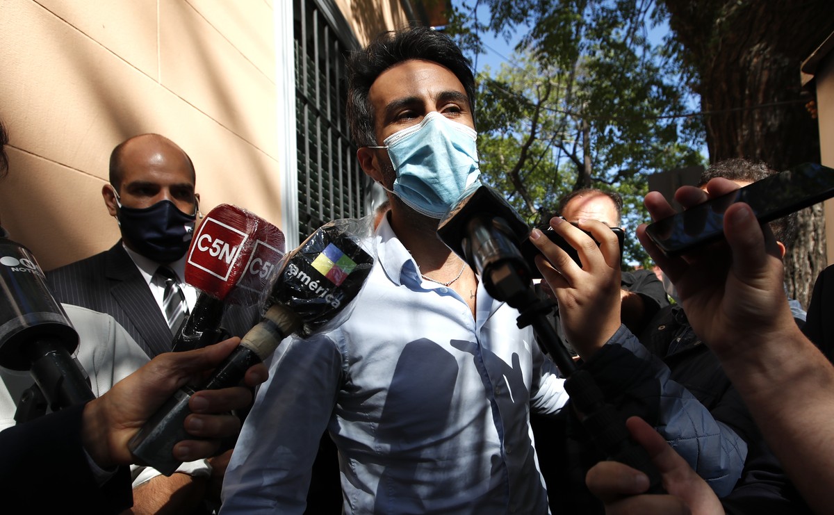 Neurologist Leopoldo Luque, former Diego Maradona's personal doctor, arrives to the prosecutor's office in Buenos Aires, Argentina, Monday, Nov. 30, 2020. Luque house and offices have been r ...