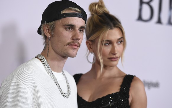 Justin Bieber and Hailey Baldwin arrive at the Los Angeles premiere of "Justin Bieber: Seasons," Monday, Jan. 27, 2020. (Photo by Jordan Strauss/Invision/AP)
Justin Bieber,Hailey Baldwin